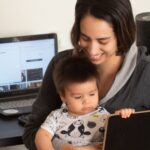 Mum with a son in front of the computer