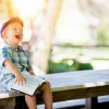 Little Boy Laughing with book