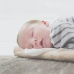 close up photo of sleeping baby